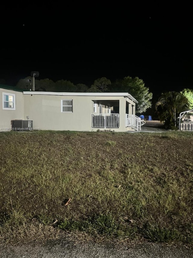 493 Camino Real Blvd, Clewiston, FL 33440 - exterior space with stucco siding
