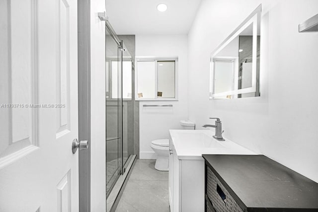 full bath featuring a stall shower, recessed lighting, toilet, marble finish floor, and vanity