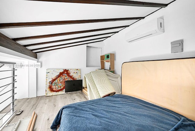 bedroom with a wall unit AC, vaulted ceiling with beams, and wood finished floors
