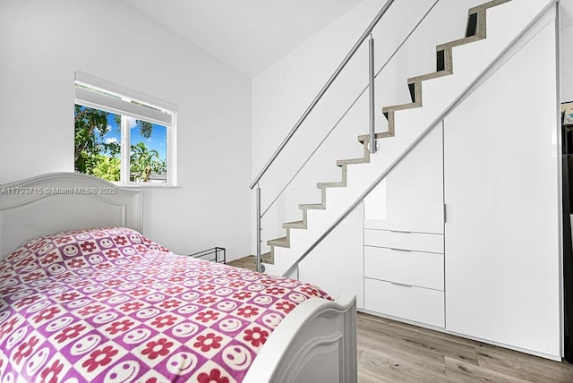 bedroom featuring light wood finished floors