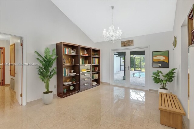 7600 SW 124th St, Pinecrest, FL 33156 - living room featuring vaulted ceiling, a chandelier, and wood finished floors