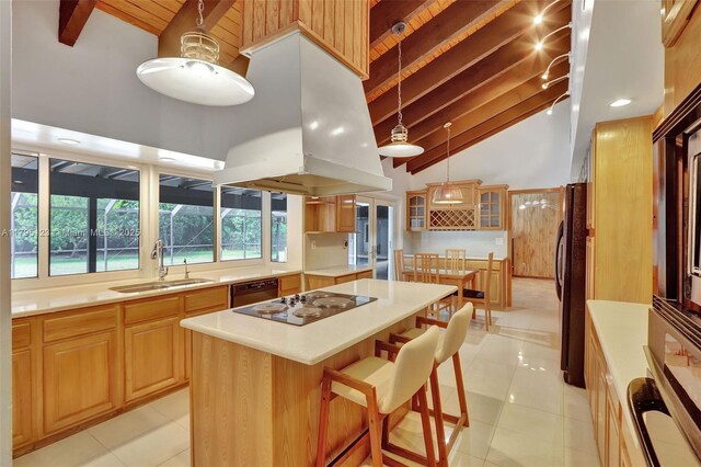7600 SW 124th St, Pinecrest, FL 33156 - kitchen with black appliances, beamed ceiling, light countertops, high vaulted ceiling, and light tile patterned flooring