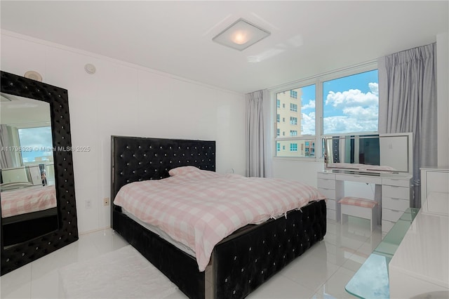 bedroom featuring light tile patterned floors