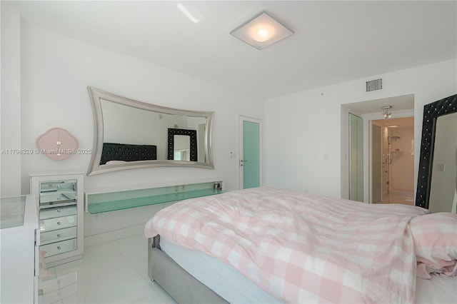 bedroom with light tile patterned floors and visible vents