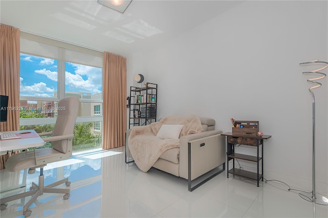sitting room with light tile patterned flooring