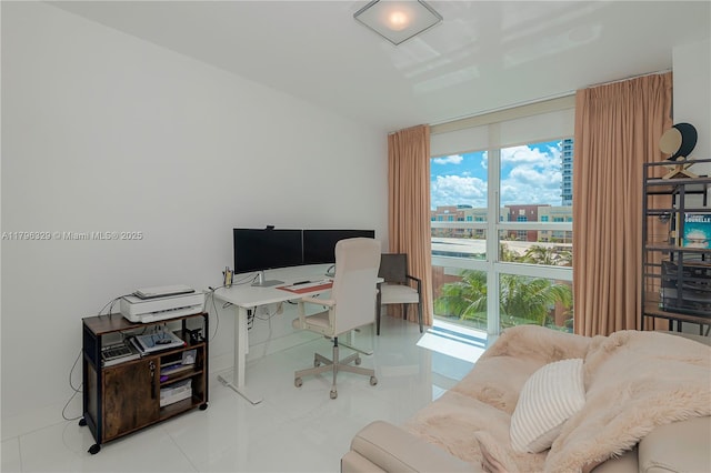 home office with tile patterned flooring