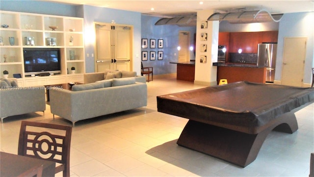 playroom featuring light tile patterned floors and pool table