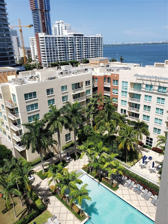 exterior space with a water view and a view of city