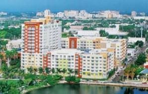aerial view with a city view and a water view