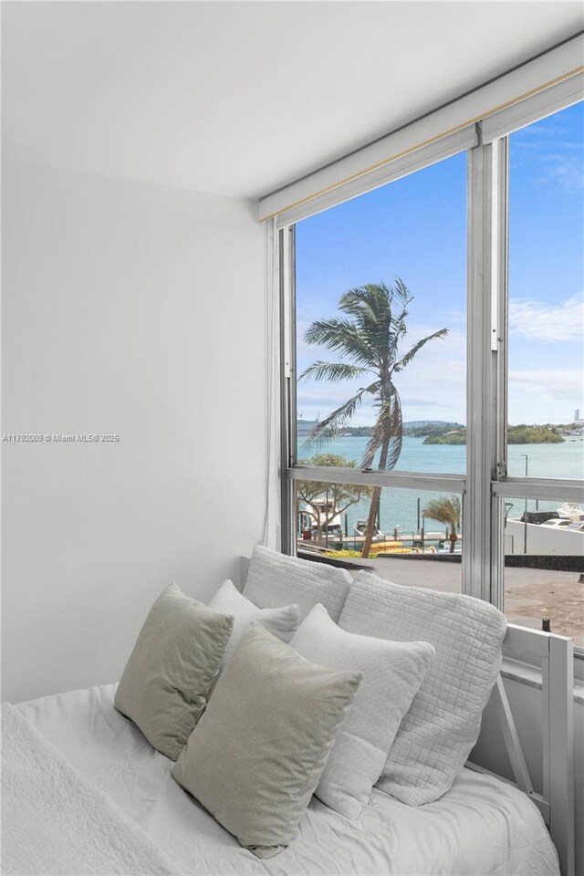 11 Island Ave Unit 407, Miami Beach, FL 33139 - bathroom with toilet and shower / bath combination with glass door