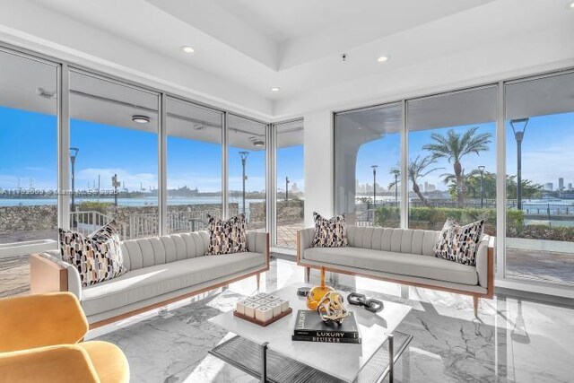 11 Island Ave Unit 407, Miami Beach, FL 33139 - recreation room with recessed lighting, marble finish floor, a chandelier, a raised ceiling, and billiards