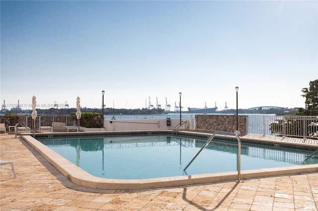 community pool with fence