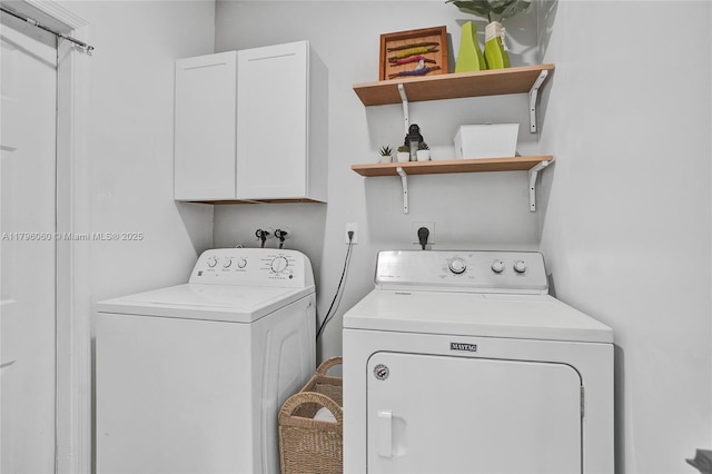 1381 Sago Ln, Weston, FL 33327 - clothes washing area featuring washer and clothes dryer and cabinet space