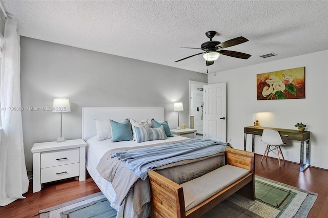 1381 Sago Ln, Weston, FL 33327 - bedroom featuring a textured ceiling, visible vents, wood finished floors, and a ceiling fan