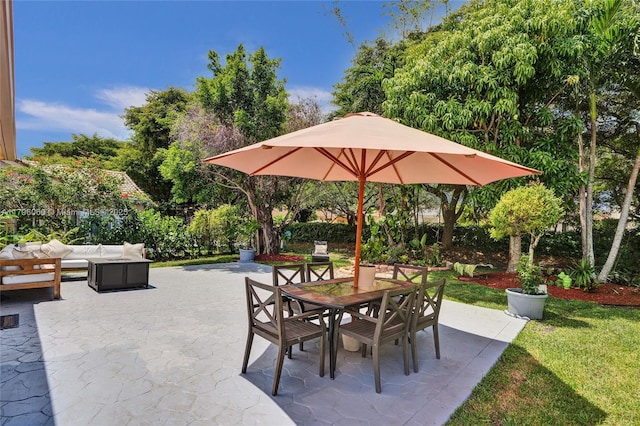 view of patio with an outdoor living space and outdoor dining space