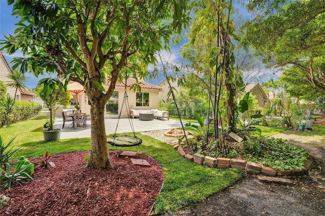 1381 Sago Ln, Weston, FL 33327 - view of yard featuring an outdoor hangout area and a patio