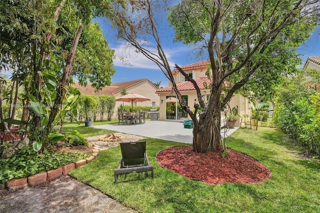 1381 Sago Ln, Weston, FL 33327 - view of yard featuring a patio area