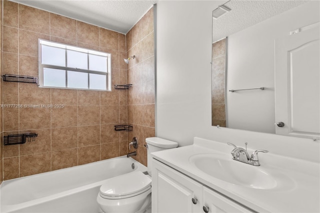 bathroom featuring vanity, a textured ceiling, toilet, and shower / washtub combination