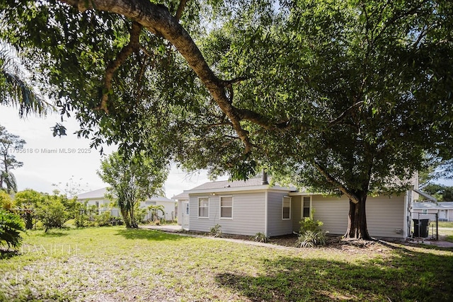 557 NW Fairfax Ave, Port St Lucie, FL 34983 - view of yard featuring fence