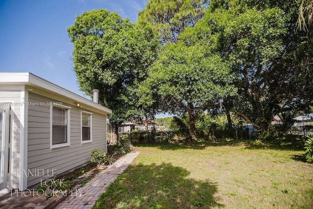 557 NW Fairfax Ave, Port St Lucie, FL 34983 - view of yard with fence