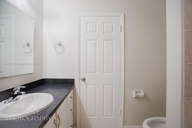 557 NW Fairfax Ave, Port St Lucie, FL 34983 - bathroom with toilet and vanity