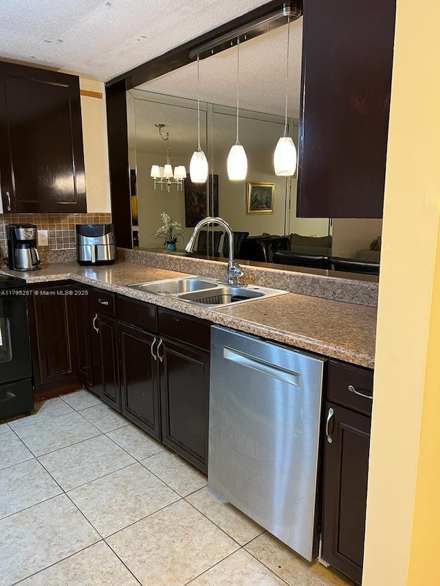 kitchen featuring a textured ceiling, dishwasher, light tile patterned flooring, a sink, and backsplash