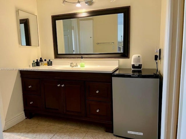 bathroom featuring tile patterned floors and vanity