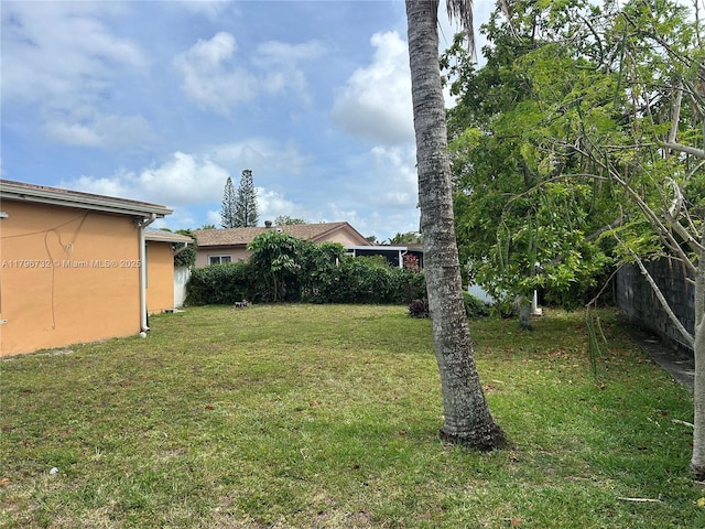 view of yard featuring fence