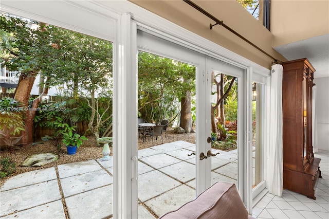 9033 SW 78th Pl, Miami, FL 33156 - entryway with french doors and light tile patterned floors