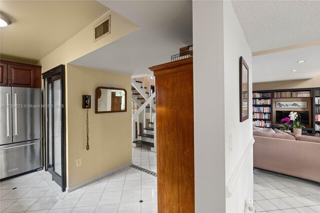 9033 SW 78th Pl, Miami, FL 33156 - hall with light tile patterned flooring, stairway, recessed lighting, and baseboards