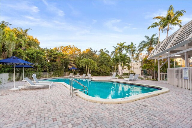 9033 SW 78th Pl, Miami, FL 33156 - community pool with fence and a patio