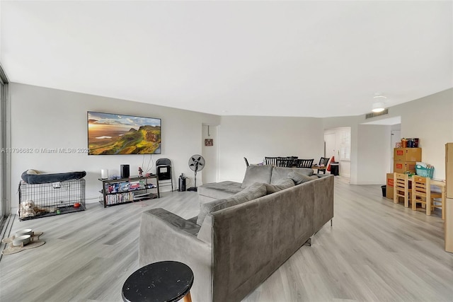 1301 NE 191st St Unit F417, Miami, FL 33179 - living area featuring light wood finished floors