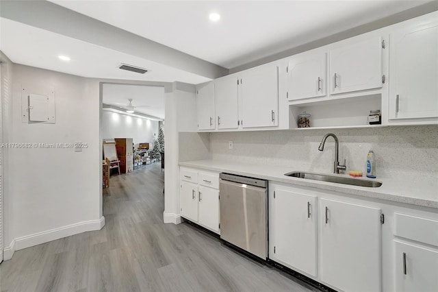 1301 NE 191st St Unit F417, Miami, FL 33179 - kitchen with a sink, open shelves, visible vents, light countertops, and stainless steel dishwasher