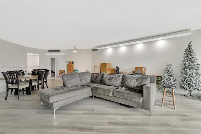 1301 NE 191st St Unit F417, Miami, FL 33179 - living area featuring light wood finished floors and visible vents