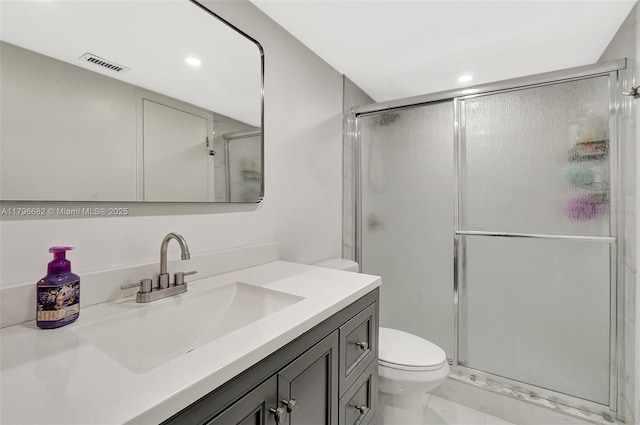 1301 NE 191st St Unit F417, Miami, FL 33179 - bathroom with a stall shower, toilet, vanity, and visible vents