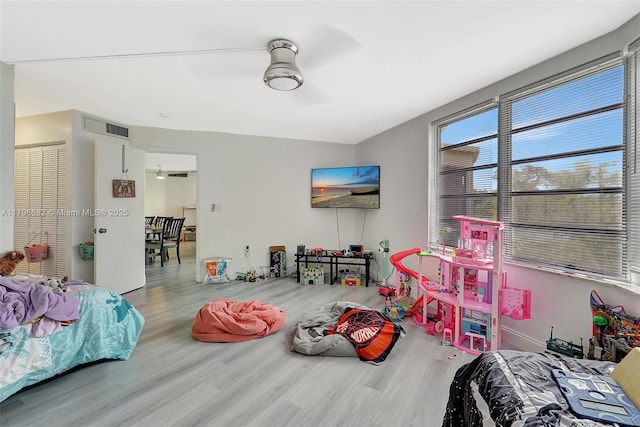 1301 NE 191st St Unit F417, Miami, FL 33179 - recreation room featuring visible vents, wood finished floors, and a ceiling fan