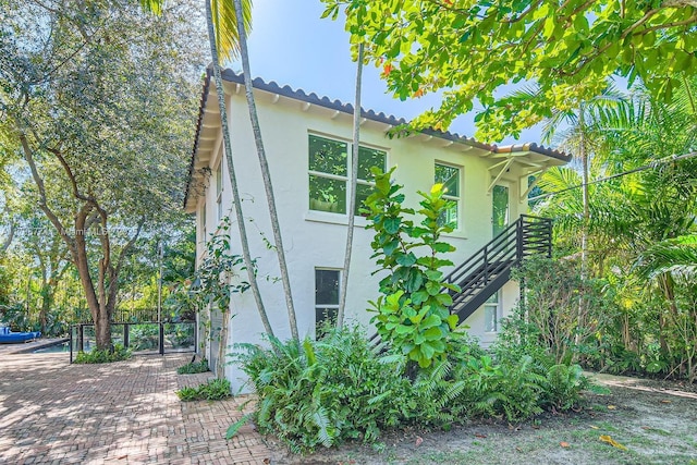 5812 Alton Rd, Miami Beach, FL 33140 - view of side of home with stucco siding