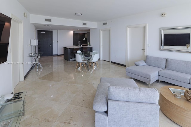 200 S Biscayne Blvd Unit 3903, Miami, FL 33131 - living room with light marble finish floors and baseboards