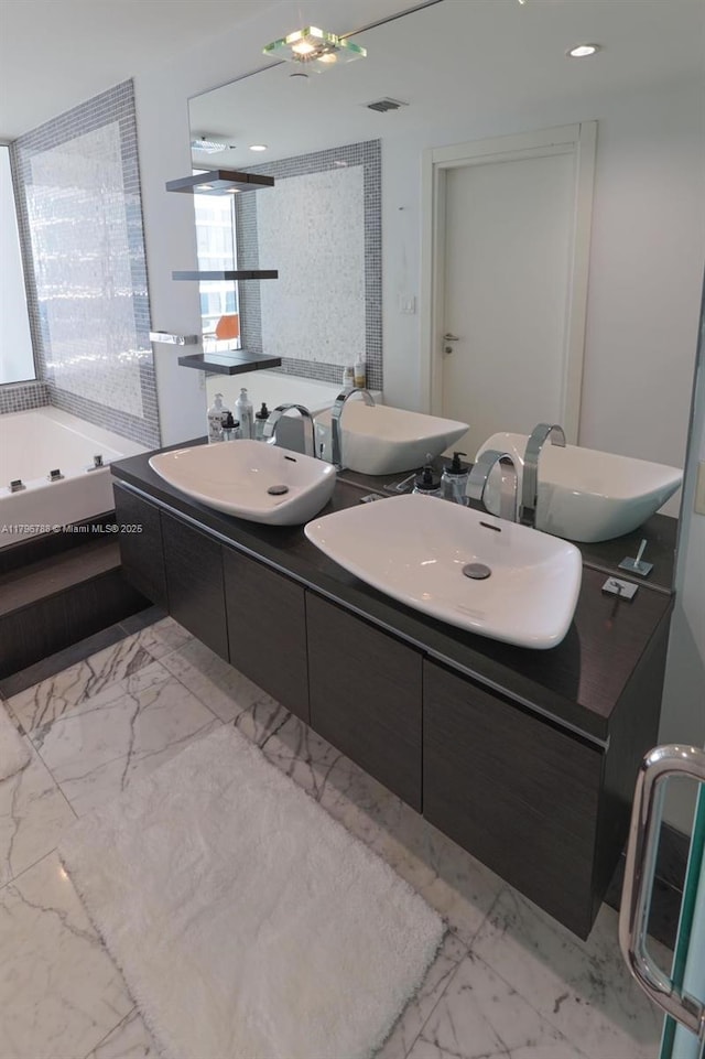 200 S Biscayne Blvd Unit 3903, Miami, FL 33131 - full bathroom featuring marble finish floors, double vanity, and a tub