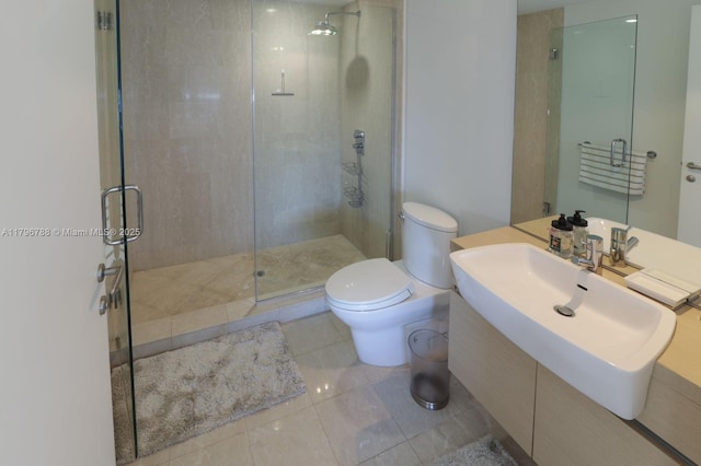 200 S Biscayne Blvd Unit 3903, Miami, FL 33131 - bathroom with a shower stall, vanity, and tile patterned flooring