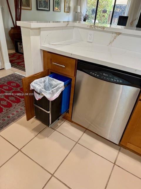 12815 SW 71st Ln, Miami, FL 33183 - kitchen featuring stainless steel dishwasher, brown cabinets, and light tile patterned floors