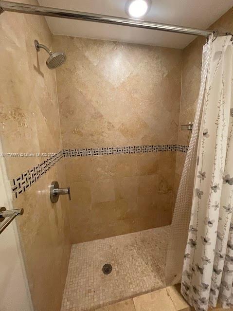 full bathroom with toilet, tile patterned flooring, vanity, and a shower with curtain