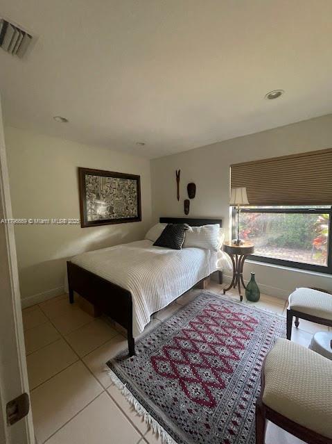 12815 SW 71st Ln, Miami, FL 33183 - tiled bedroom featuring baseboards and recessed lighting