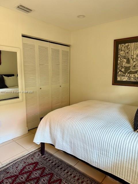 12815 SW 71st Ln, Miami, FL 33183 - tiled bedroom with a closet