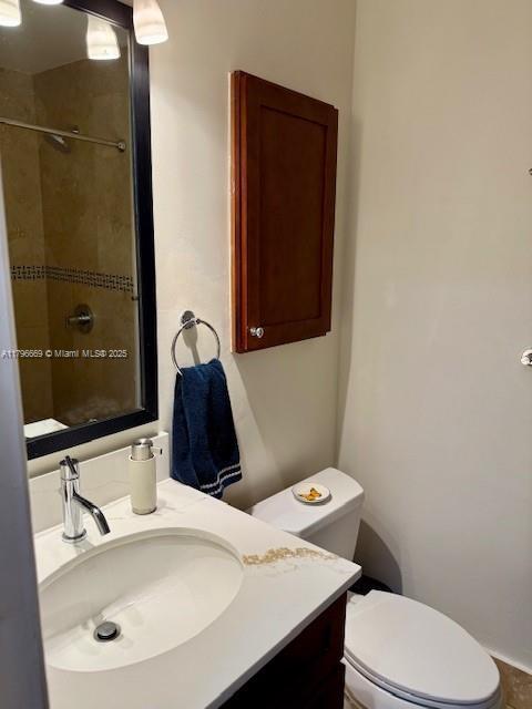 12815 SW 71st Ln, Miami, FL 33183 - full bathroom featuring vanity, toilet, and a shower