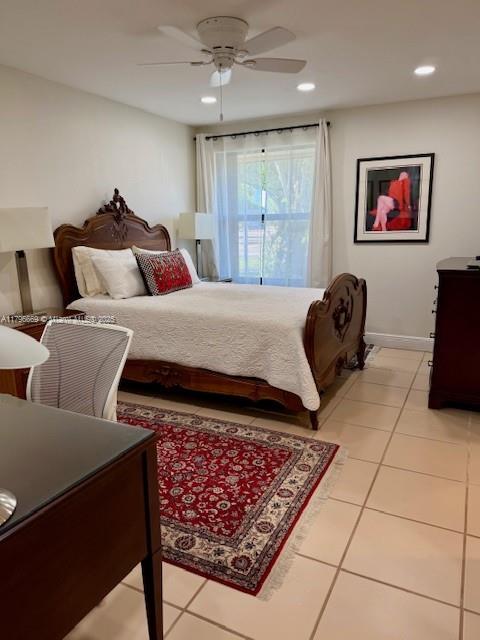 12815 SW 71st Ln, Miami, FL 33183 - bedroom with light tile patterned floors, recessed lighting, a ceiling fan, and baseboards