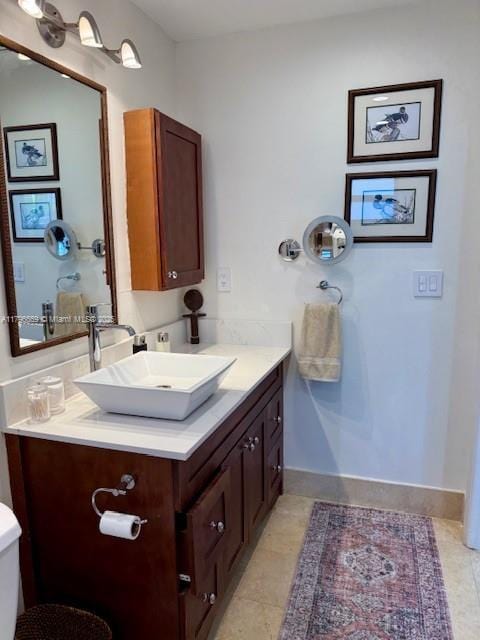 12815 SW 71st Ln, Miami, FL 33183 - bathroom featuring vanity, baseboards, tile patterned flooring, and toilet