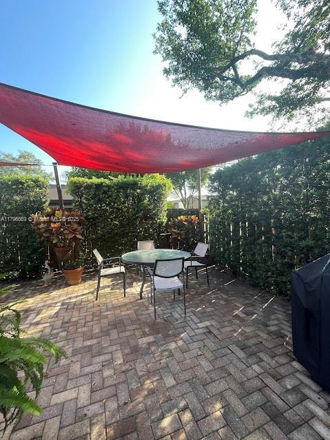 12815 SW 71st Ln, Miami, FL 33183 - view of patio / terrace featuring outdoor dining space