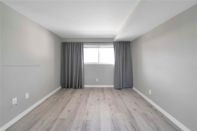 200 Galen Dr Unit 308, Key Biscayne, FL 33149 - unfurnished room featuring light wood-style floors and baseboards