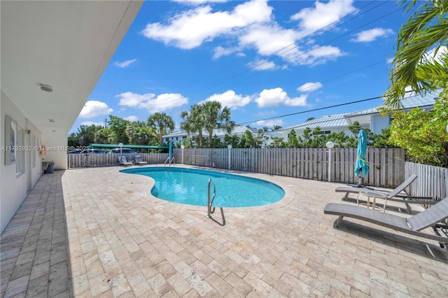 200 Galen Dr Unit 308, Key Biscayne, FL 33149 - view of pool featuring a patio, a fenced in pool, and a fenced backyard